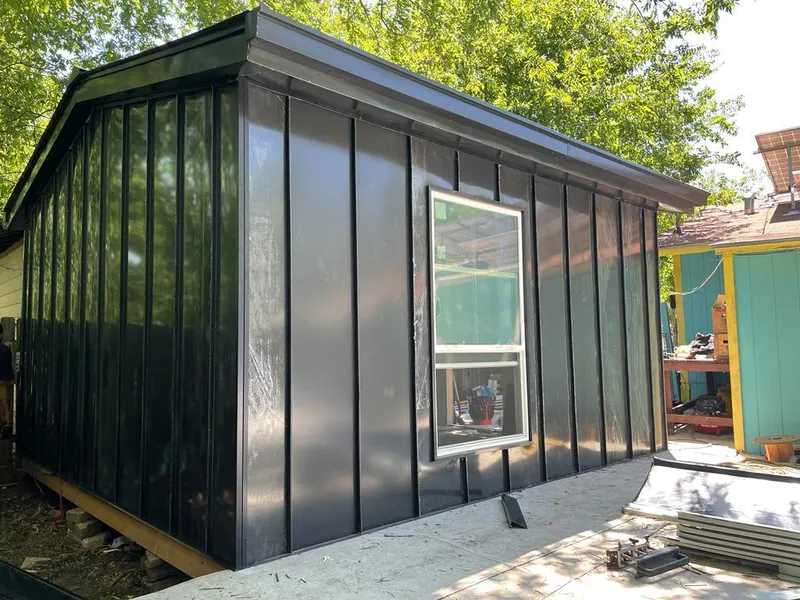 Black standing seam metal wall panels for Metal Roof Installation in Hammond